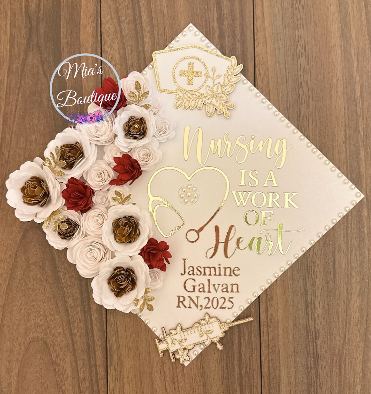 Custom Personalized Nurse Graduation Cap Topper Heart Stethoscope with Nursing Is A Work Of Heart Message and Floral Sunflowers White Red Gold Flowers Gold Butterfly