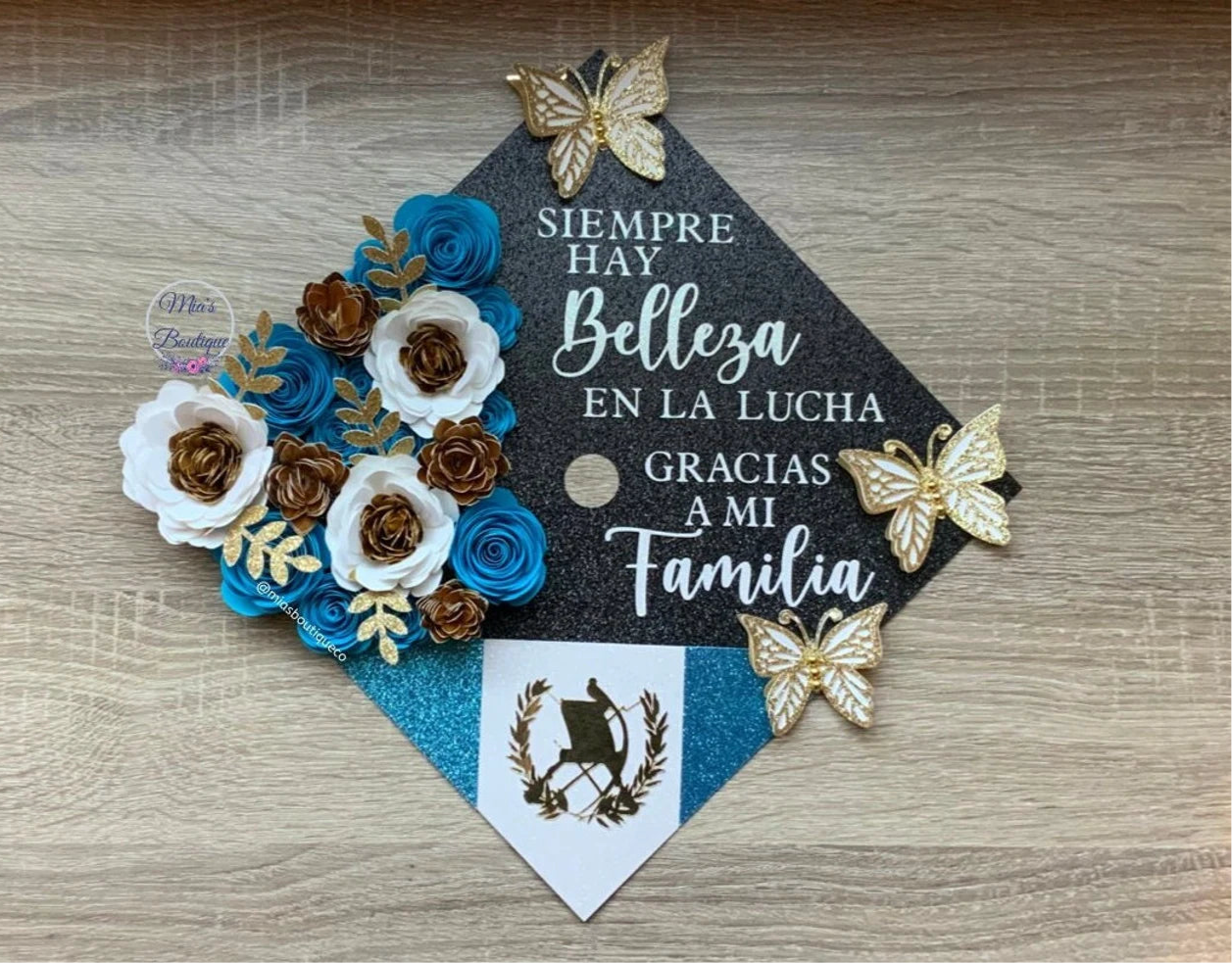 Custom Personalized Graduation Cap Topper Guatemala with Floral sunflowers gold butterflies and Para mis Padres message